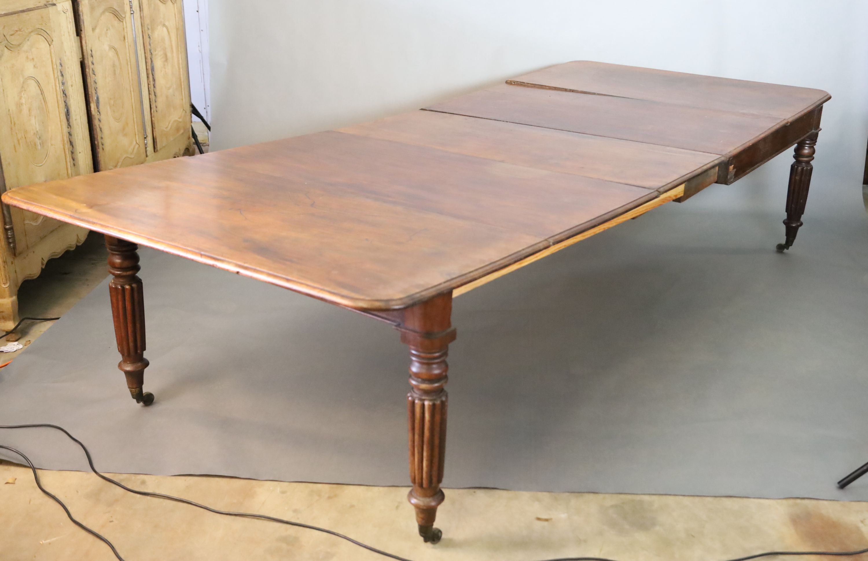 A Victorian mahogany extending dining table,